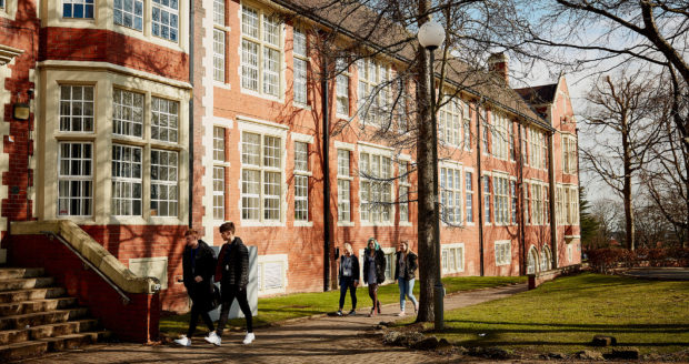 A group of students walking towards Sunderland College Bede Campus.