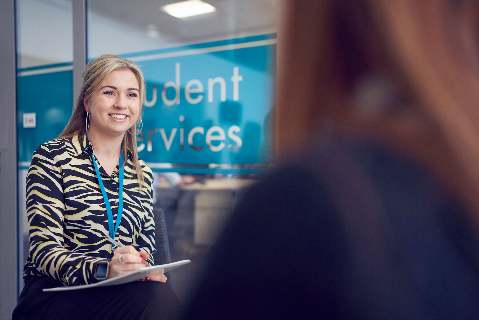 A student support counsellor providing support to a student at Sunderland College