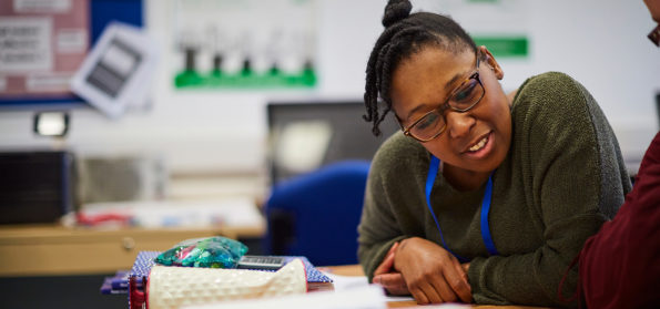 A Sunderland Collede student studying accounting in a classroom.