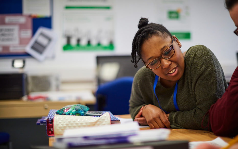 A Sunderland Collede student studying accounting in a classroom.