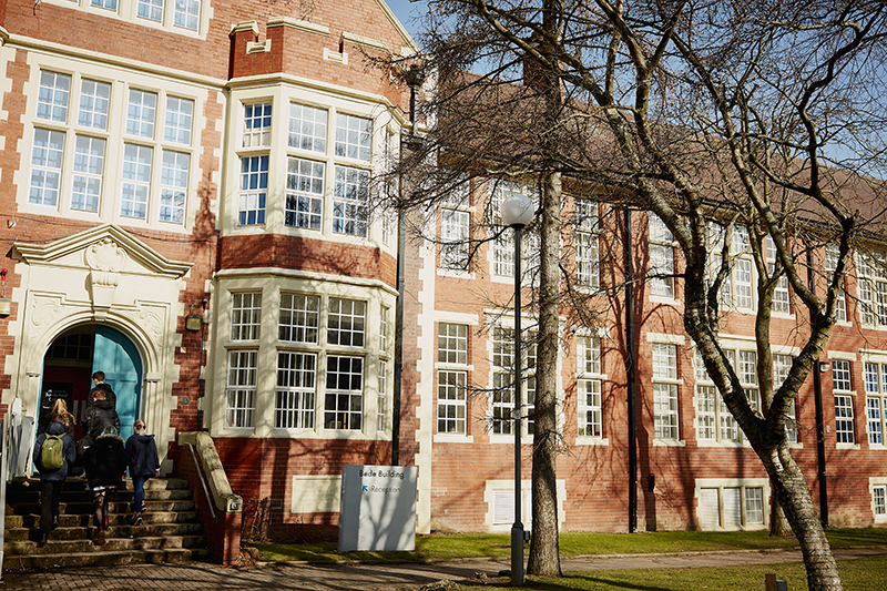A group of students walking towards Sunderland College Bede Campus.
