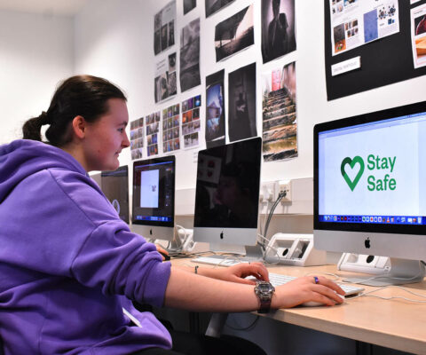 Keira Todd, Digital Art student, working on her Stay Safe logo in The Arts Academy at Bede Campus.